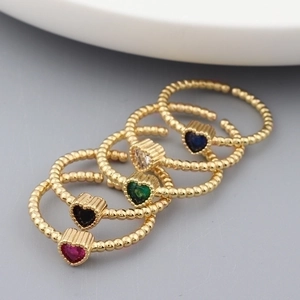 Set of five 18k gold plated stackable rings with multicolored heart-shaped gemstones