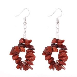 Detailed view of handmade cluster earrings featuring natural red jasper gravel beads