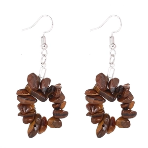 Natural tiger eye stone hoop earrings with silver-colored hooks on white background