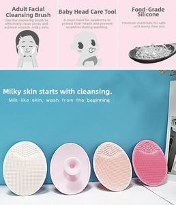 Close-up of food-grade silicone facial brush with fine bristles and suction cup handle