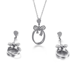 Silver bow jewelry set with sparkling crystals featuring necklace and dangle earrings