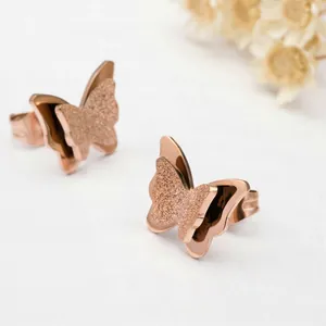 Pendientes de mariposa en oro rosa con doble capa mate y pulida de diseño sofisticado