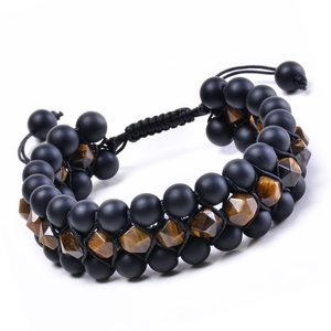 Adjustable double-layer beaded bracelet featuring matte black stones and faceted tiger eye