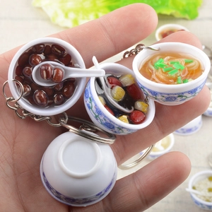 Miniature blue and white porcelain bowl keychain with realistic Chinese food model