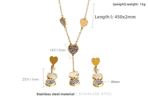 Detail view of heart-shaped stainless steel necklace and earrings set with shell inlay