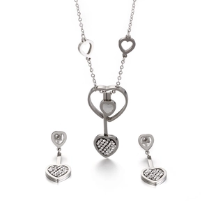 Parure collier et boucles d'oreilles cœur en argent avec design ajouré et cristaux