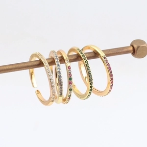 Adjustable gold open rings set with colorful zircon stones in white, green, and pink