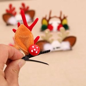 Pince à cheveux bois de renne pailletés et champignon rouge pour Noël avec fourrure