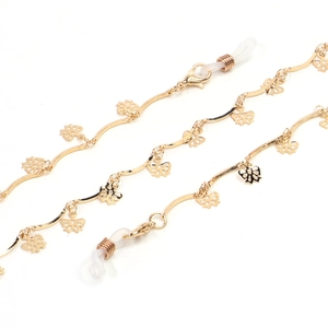 Elegant gold butterfly eyewear chain with wavy metal links and non-slip silicone loops