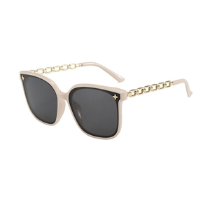 Lunettes de soleil oversize pour femmes avec monture nude et branches en chaîne dorée