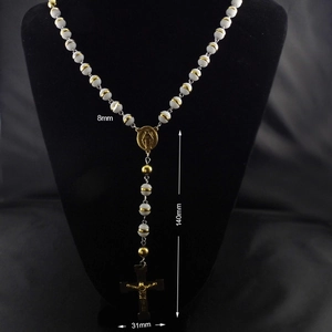 Detail showing 8mm white beads and 31mm metal crucifix on rosary cross necklace