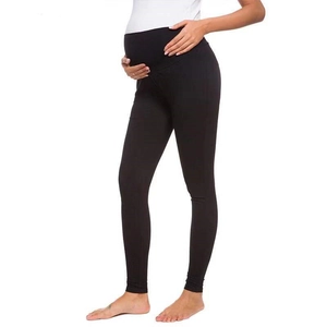 Detail view of the black maternity leggings featuring a high waist support band for comfort