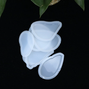 DIY crystal resin silicone molds in various shapes for jewelry making on black background