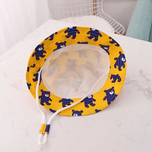 Detail of yellow toddler sun hat with blue bear print and adjustable windproof chin strap