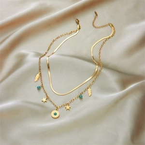 Double-layer gold stainless steel necklace with turquoise pendant and star feather charms