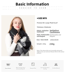 Detail view of large black and white checkered cashmere scarf with fringe, 140x140cm