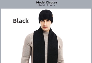 Close-up of black ribbed knit winter set featuring a warm beanie and matching scarf