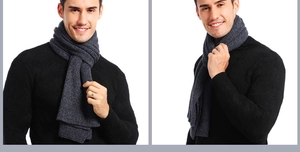 Detail of dark grey thick ribbed knit scarf for men showing warm winter texture