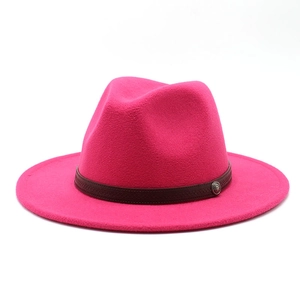 Classic wide brim wool felt fedora in vibrant magenta with brown leather band and emblem