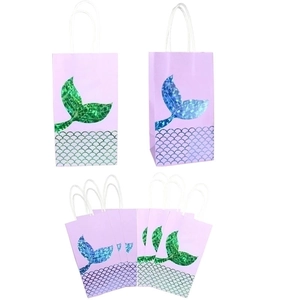 Mermaid party gift bags with gold foil tails and handle, pink and purple paper treat bags