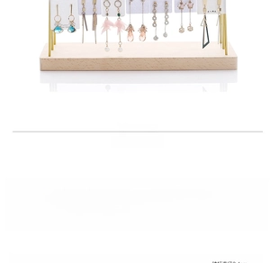 Close-up of wooden base and metal frame on a multi-functional jewelry display stand