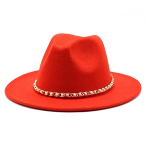 Classic red wide brim fedora hat featuring elegant gold chain and white pearl embellishments