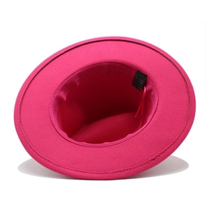 Detail view of the rose red jazz hat interior lining with size XL label and fabric tag