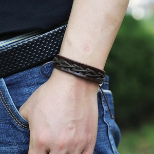 Men's vintage brown braided leather bracelet with multi-layer cord weaving on wrist