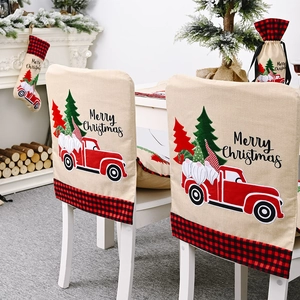 Linen Christmas chair cover featuring a red truck, gnome, and Merry Christmas text