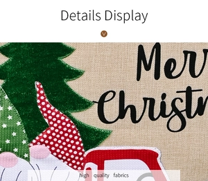 Detail of high quality linen fabric featuring gnome and truck Merry Christmas print