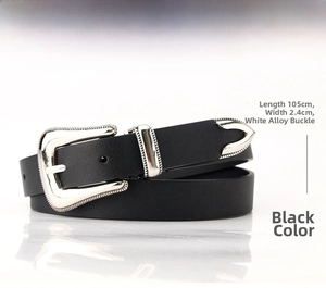Detail of black faux leather belt with vintage floral engraved buckle and metal tip