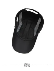 Interior view of black quick-dry sports cap showing mesh lining and neat stitching