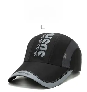 Detail of breathable grey mesh fabric and printed letters on a sporty black baseball cap