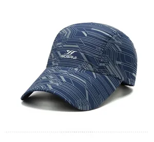 Detail of navy quick-dry baseball cap featuring gray geometric patterns and breathable fabric