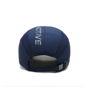 Rear view of quick-dry navy baseball cap showing breathable mesh and metal buckle