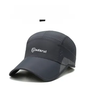 Detailed view of the breathable mesh fabric and ventilation holes on a grey sun cap