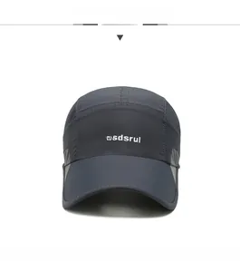 Detail of breathable mesh panels and brand logo on dark grey quick-dry baseball cap