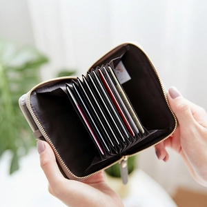 Women's PU leather zip-around folding wallet with multi-card slots and coin pocket