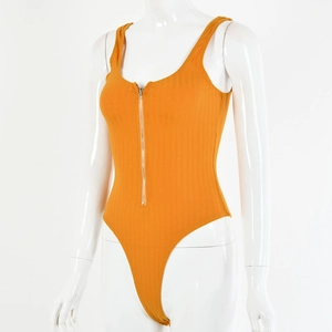 Detail of yellow ribbed bodysuit featuring a front zipper and sleeveless high-cut design