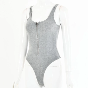 Detail of grey ribbed knit bodysuit featuring a front silver zipper and scoop neckline