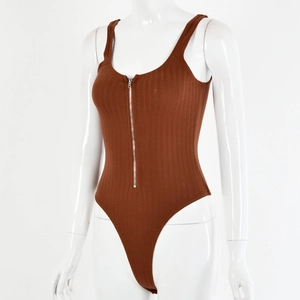 Close-up of brown ribbed bodysuit featuring a front silver zipper and U-neckline detail