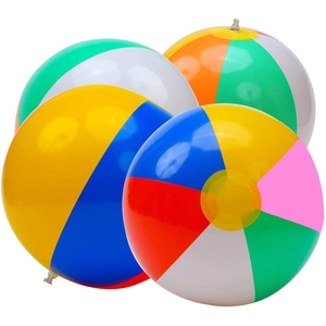 Set of four colorful inflatable PVC beach balls with multi-color segmented panels