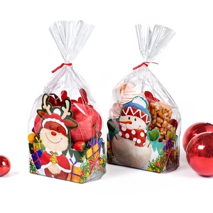 Christmas gift bag with cartoon reindeer and snowman motifs and red sealing ties