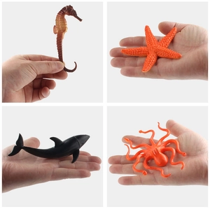 Detail of realistic sea creature models including starfish and octopus held in hand