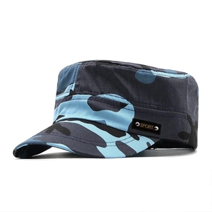 Detail of blue camouflage flat top cap showing metal rivets and SPORT label on cotton fabric