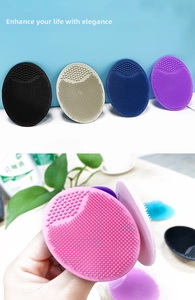 Close-up of flexible silicone facial cleansing brush set in various vibrant colors