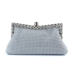 Elegant silver evening clutch bag with shimmering rhinestones and a metallic lock