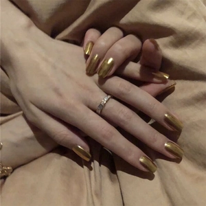 Glossy golden mirror finish medium-long press-on nails in elegant square-oval shape