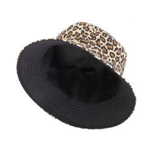 Classic reversible leopard print bucket hat with solid black lining and wide brim