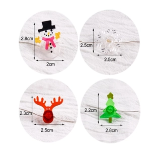Christmas LED string light charms featuring snowman, snowflake, reindeer and tree shapes